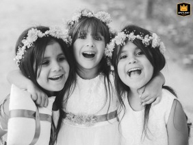 Igreja da Maia, Porto, Portugal, is where the bride’s three young nieces, all serving as ring bearers, gather closely for a delightful quick picture together before the wedding ceremony.